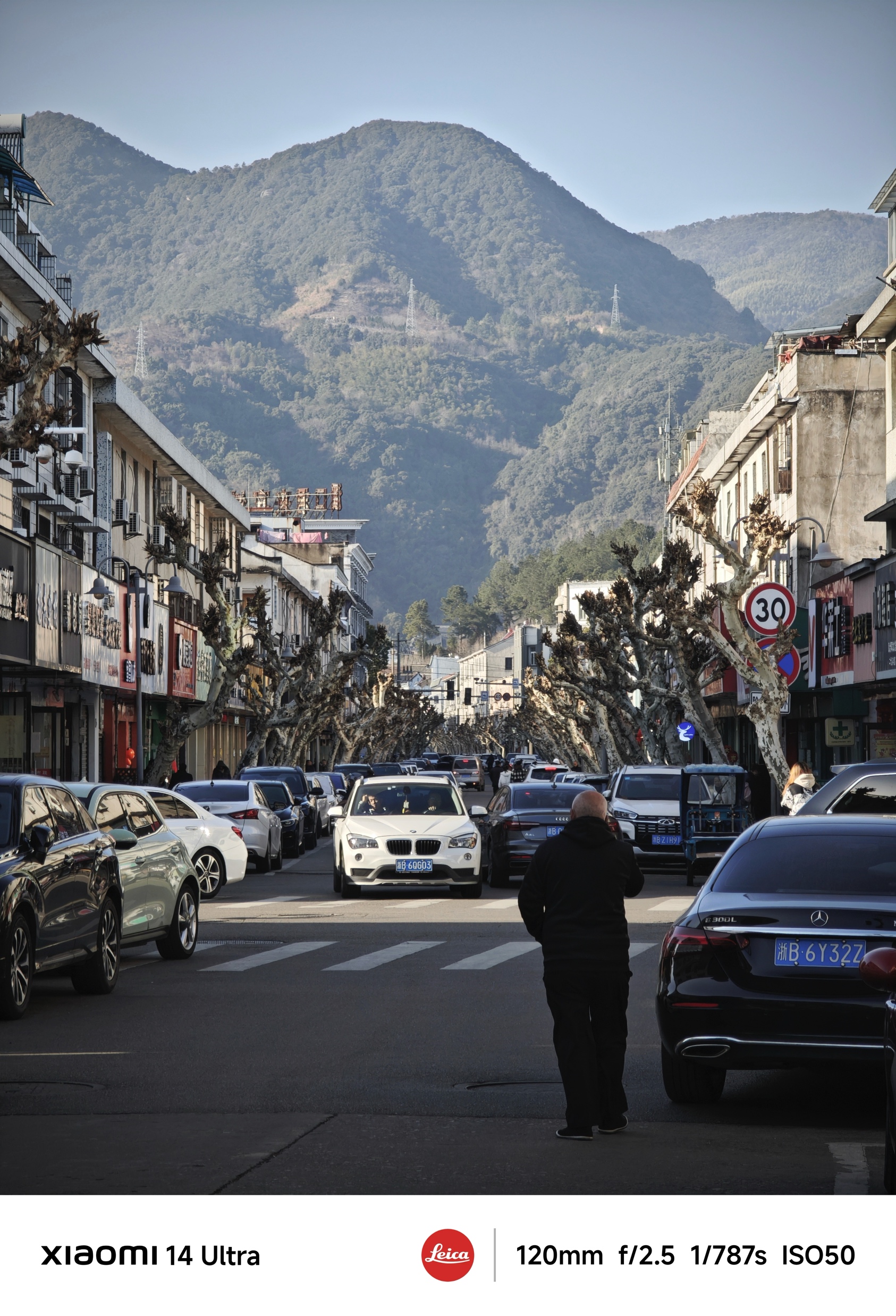 A street leading toward the mountains